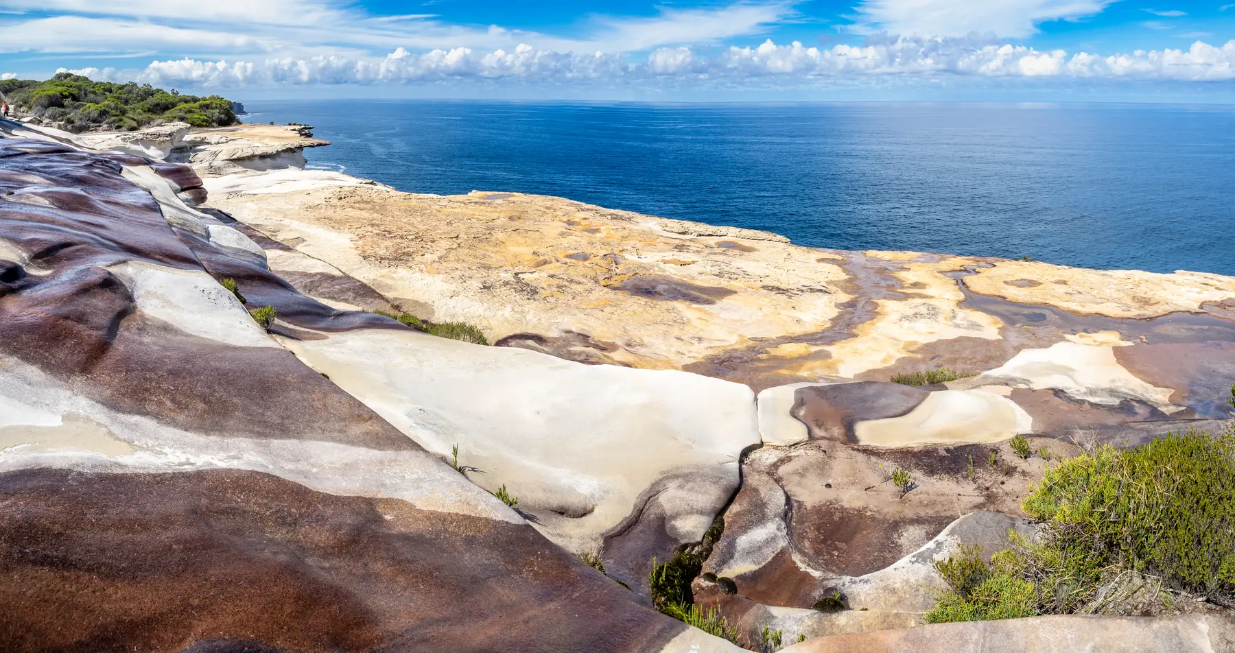 Sandstone cliffs above a blue sea on the Australian coast